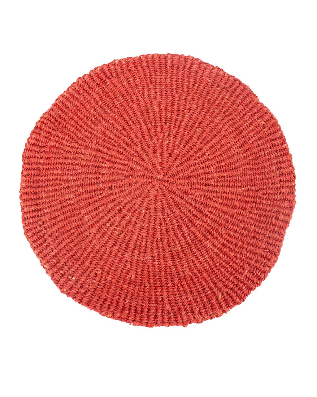 Round red woven placemat on a white background