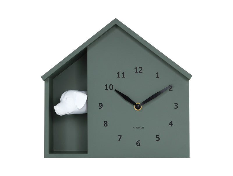 Green peeking dog clock on a white background