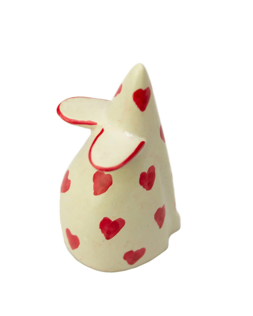 White soapstone mouse figurine with red heart patterns on a white background
