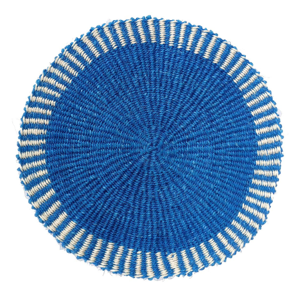 Round blue woven mat with white stripes on a white background