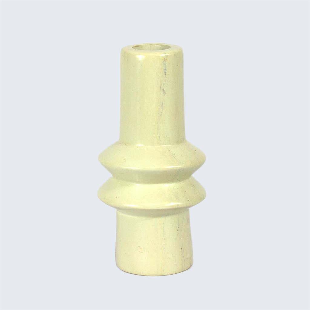 Beige soapstone vase on a light gray background