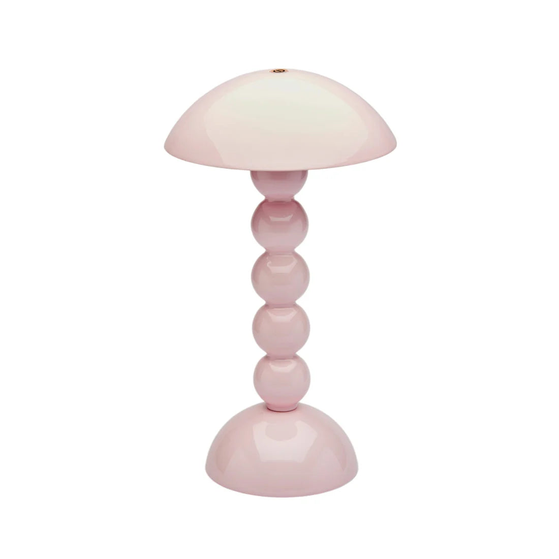 Pink table lamp with a white shade on a white background