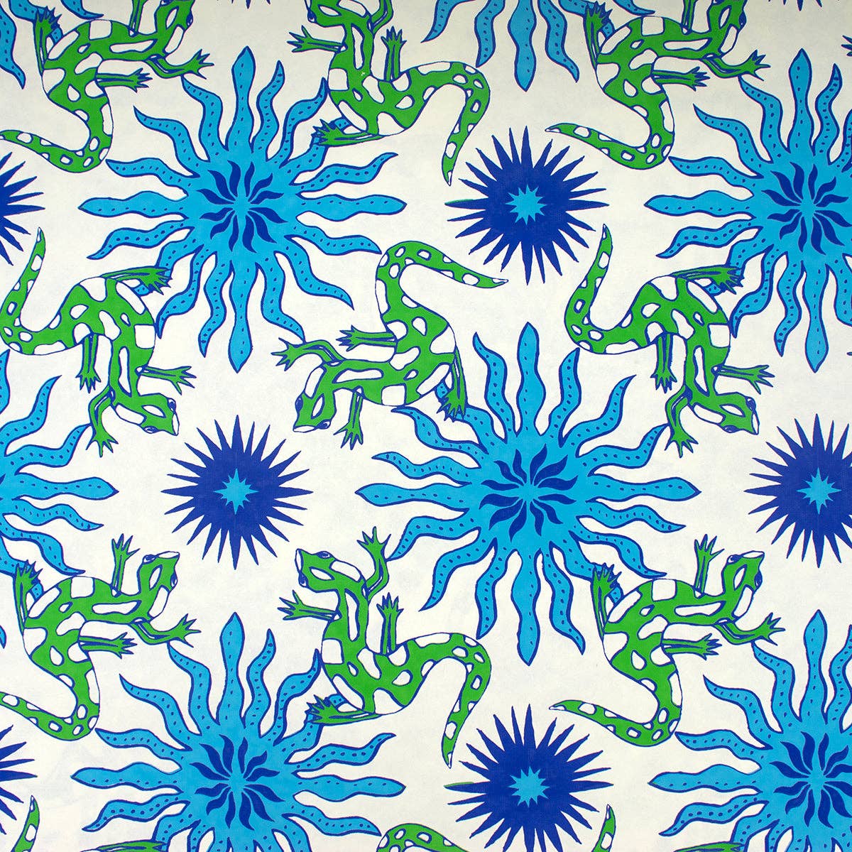 Pattern of green lizards and blue starburst shapes on a white background
