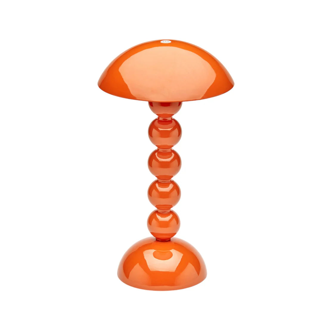 Orange table lamp with a unique design on a white background